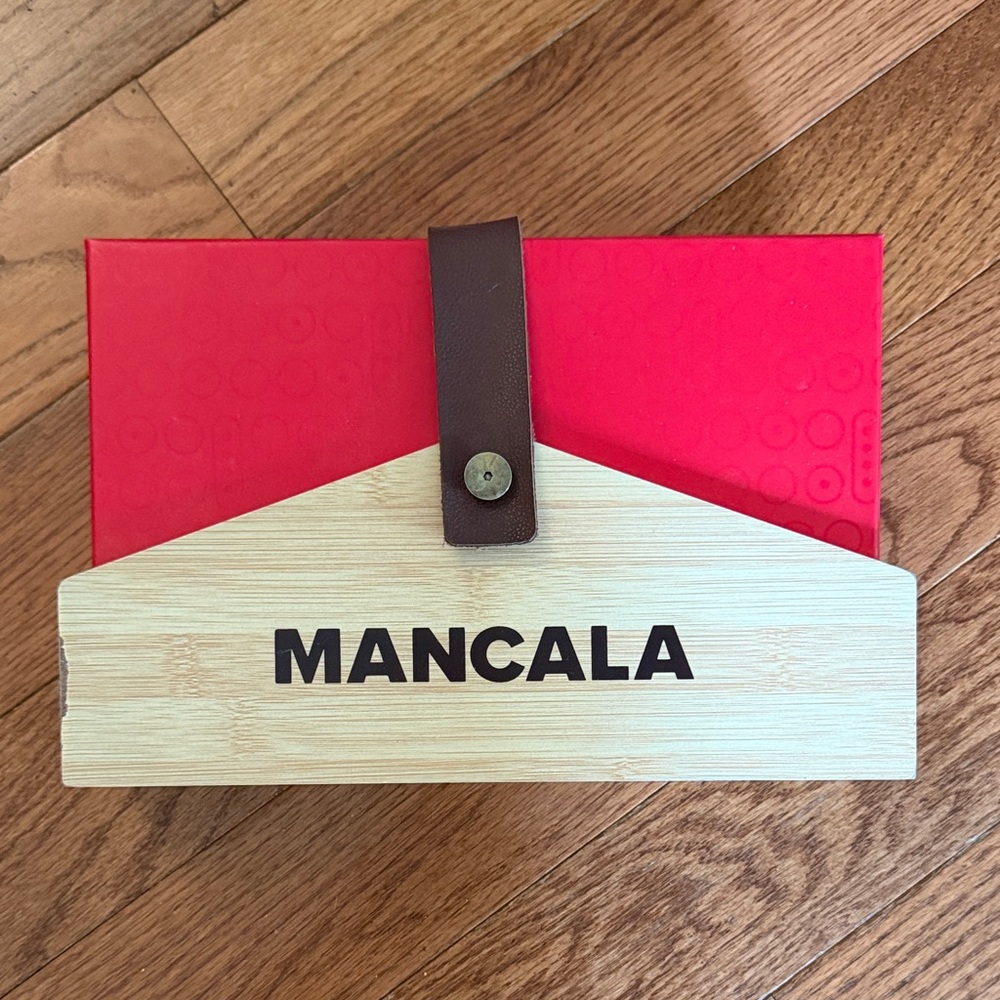 Mancala game. Never used
